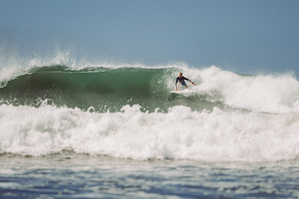 Guy surfing in Costa Rica Guy surfing in Costa Rica